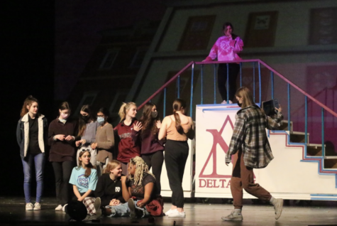 On January 22, the cast of Legally Blonde began rehearsals with mic checks, lighting checks, and other technicalities. Senior Cameron Parham sings from the top of the staircase while the rest of the cast sings on stage, rehearsing a scene from the musical.