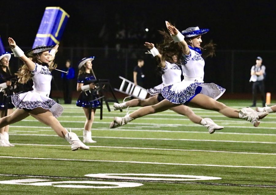 The Silver Wings perform at the homecoming game on Oct. 22. In the fall, the Silver Wings focus on performing at pep rallies and for halftime. 
