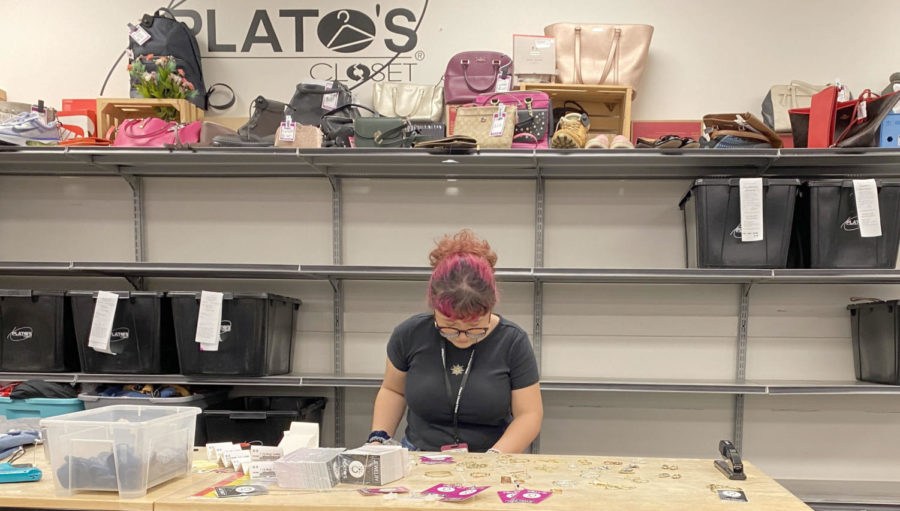 Sophomore Madeline Rivera tags jewelry at Plato’s Closet, a local thrift store. This is her first job ever and she said that she has learned a lot from it.
