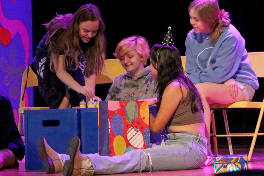 (Left to right) Sophomores Macy Scott, Kody Stines, Isabella Martin Del Campo and junior Emma Short rehearse “Tales of a Fourth Grade Nothing” on the Hebron 9th Grade Campus cafeteria stage. The actors have been practicing every day during first period for about a month.