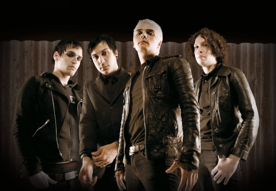 MCR members with lead singer Gerard Way (center left) / Photo via Rock Sound Magazine