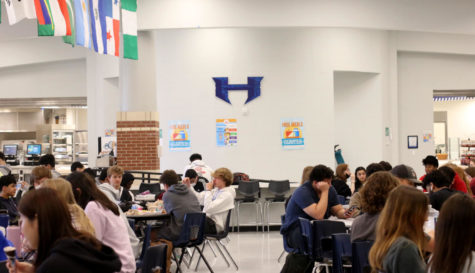 Students eat in the cafeteria during C lunch on March 31. Since the 2020-21 school year, the advisory schedule has been exclusively used where students are assigned A, B, C or D lunch based on their third period teachers.