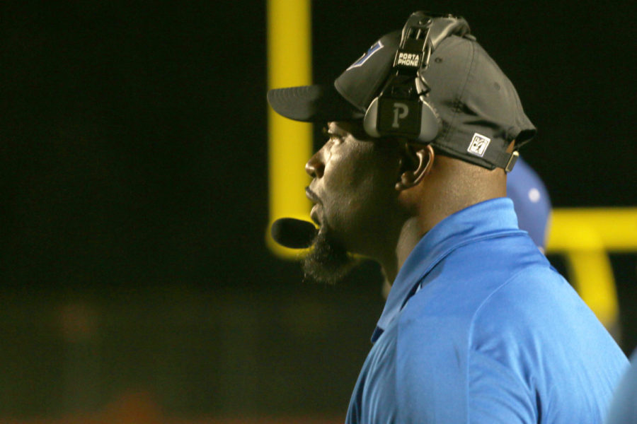 Defensive coordinator Quincy Stewart watches a play at the first home game of the season Sept. 2. This is his first year at Hebron.