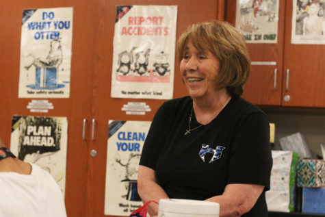 Chemistry teacher Gale Hunt laughs with her students before they take a quiz during second period on Sept. 25.