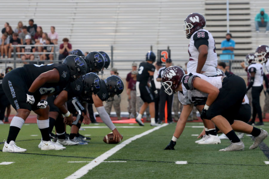 The+Hawk+offense+lines+up+against+Wylie+on+Sept.+2.+The+game+ended+with+Hebron+winning+28-13.