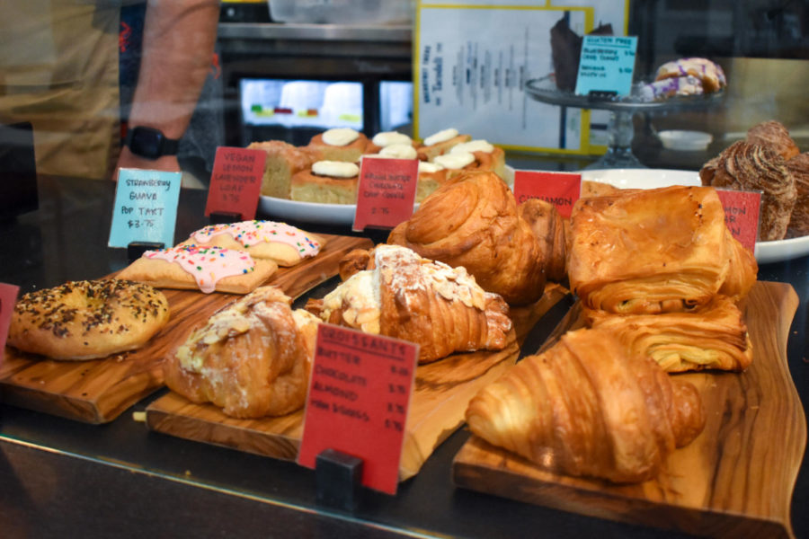 Croissants, pop tarts, vegan bread and other bakery items are on display at the front counter of Parks Coffee.