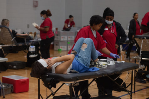 A student prepares to donate blood. The donating process typically takes around 30-45 minutes.
