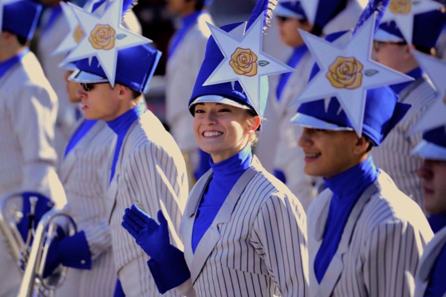 I march and wave to my family in the stands at the Tournament of Roses Parade in Pasadena, CA on Jan. 1. The band was invited to march in the parade at the awards ceremony of the 2019 Bands of America Grand Nationals competition in Indianapolis.