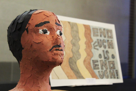 A paper mache model of Martin Luther King Jr. sits on a table in the entryway. The district accepted different forms of art relating to MLK to display at the event, whose creators were later given awards. 