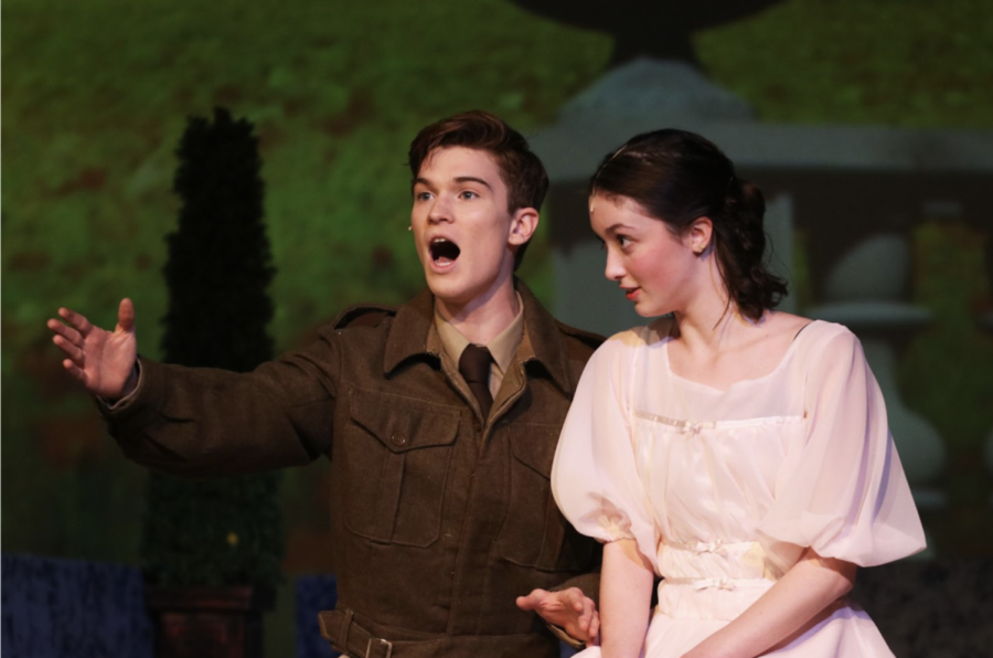 Senior Kyler Beck and junior Sophia Wheeler sing “Sixteen Going on Seventeen” during a rehearsal on Jan. 17. The fine arts department will perform the schoolwide musical the weekends of Jan. 19 and Jan. 26 in the auditorium.