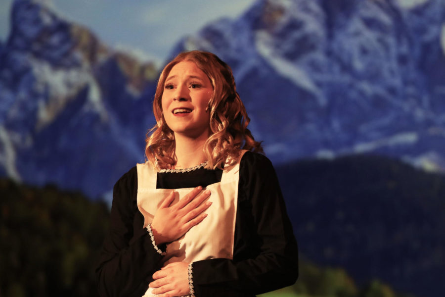 Senior lead Emma Foughty sings “The Hills Are Alive” during a rehearsal on Jan. 17. Foughty grew up watching the different movie adaptations of “The Sound of Music” with her mother and her grandmother, along with many other classic Rodgers and Hammerstein musicals. 