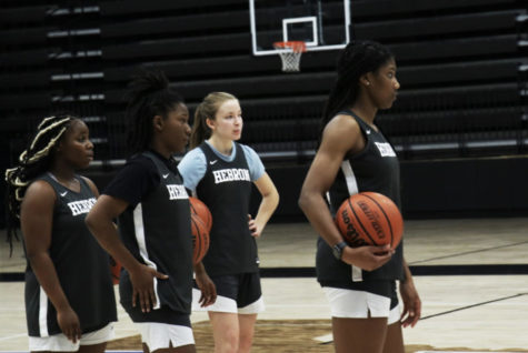 Freshman Nariah Johnson, sophomore Sydnee Jones, senior Dana Gringey and junior Paris Bradley line up during a practice on Nov. 2. The team was preparing for its first game against Cooper on Nov. 4, where they lost with a final score of 67–61.
