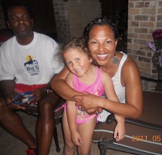 I pose for a photo with my step-father’s parents, my Grand Gigi and Grand Bambam, in May of 2011. We attended a pool party at their friend’s home, where we ate cake and enjoyed each other’s presence.