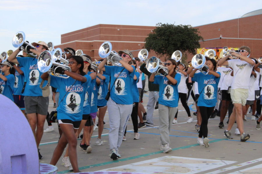 The mellophone section rehearses the closing of the band’s 2022 show “Odyssey FM.” The show ends on a mellophone feature, with the entirety of the section arranging themselves on top of and around props built to look like CDs. The band won first place at the Bands of America competition, having competed with bands across the state. 