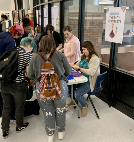 Students surround the aromatherapy station at last year’s Student Health and Wellness Fair on April 1. This was one of the many vendors that were lined up in the main hall for the event.