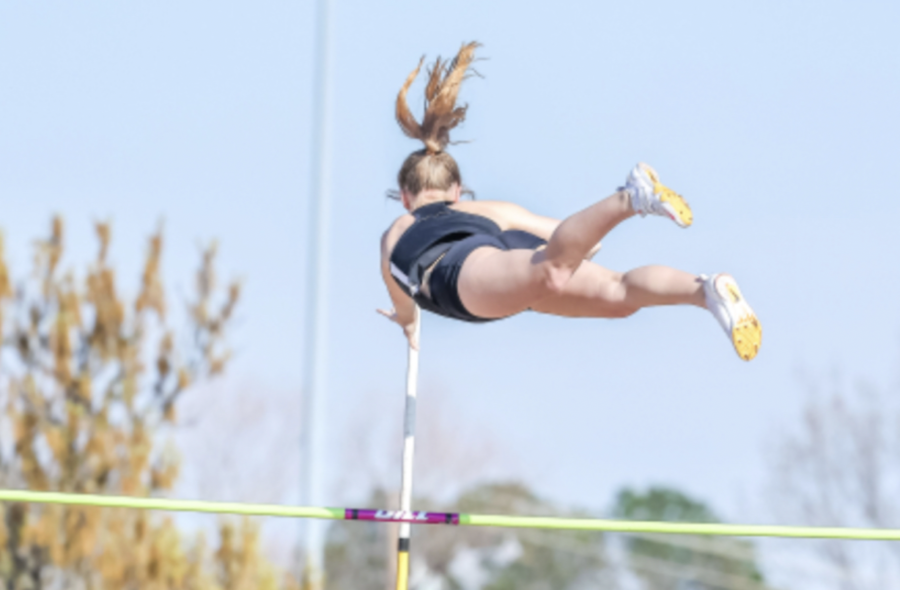 Leeah+Boyd+pole+vaults+at+a+meet+March+17.+Leeah+is+one+of+three+sophomores+girls+in+the+state+with+a+personal+record+of+at+least+12+feet%2C+leading+with+an+inch+difference+between+her+and+fourth+place+and+a+foot+difference+between+her+and+tenth+place.+%28Photo+provided+by+Kerri+Boyd%29