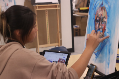Sophomore Karen Chen paints a portrait during her third period art class.
“When I was younger, I didn’t know what I wanted to pursue,” 
Chen said. “[Art] was 
one of the few things I enjoyed, [and] my friends were saying I was good at [it], so I said, ‘Why not just pursue something I might be good at in the future?’”
