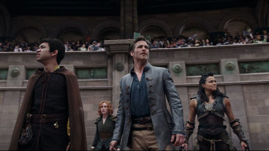 The four main characters look around an arena. Chris Pine, who plays Edgin, has starred in multiple shows and movies, including the “Star Trek” franchise, “Into the Woods,” and “Wonderwoman.” (Photo via Paramount Pictures)
