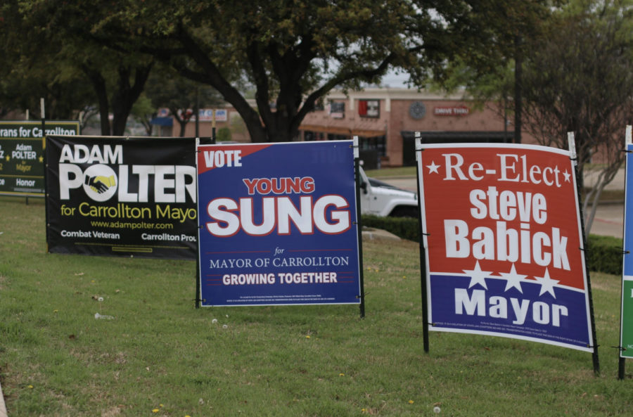 Signs+from+Carrollton%E2%80%99s+mayor+candidates%2C+Adam+Polter%2C+Young+Sung++and+Steve+Babick%2C+are+displayed+on+the+intersection+of+Hebron+Parkway+and+Old+Denton+Road.+