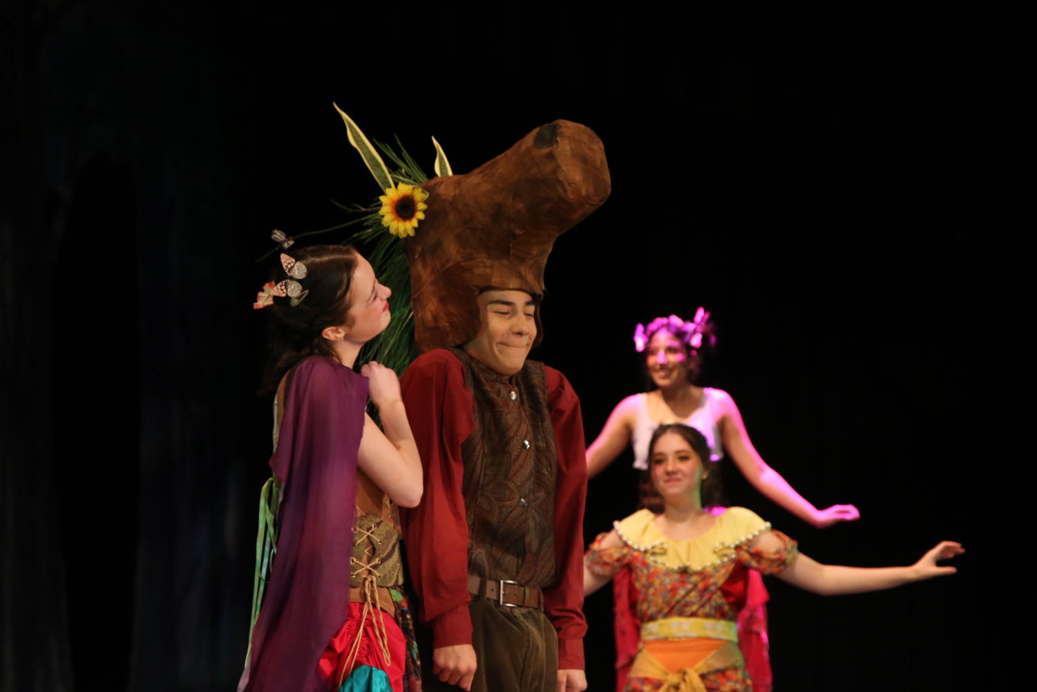 Junior Sophia Wheeler (left) and freshman Zach Carvajal (right) perform a scene during a dress rehearsal for Shakespeare’s “A Midsummer’s Night Dream” on May 18. Though the comedy is mainly written in Shakespearean English, the cast has added multiple ad-libs to modernize the play. “There were a lot of questions that first week,” head director Chesley Thornburg said. “How do I perform Shakespeare? What am I even saying? What is the plot? And it’s comedy, too, so the biggest question was: how do I make this funny?”