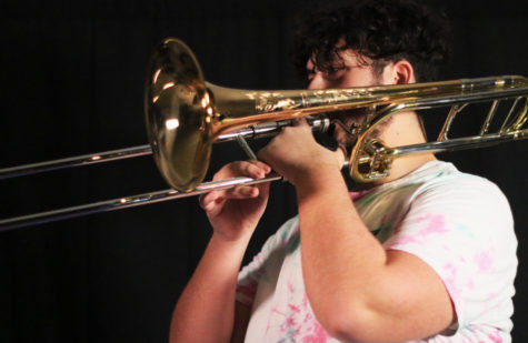 Senior Malik Hamza has been playing trombone since middle school. Originally, he did not want to play trombone, but after a fitting, he was told he had bad finger dexterity and was put on trombone.