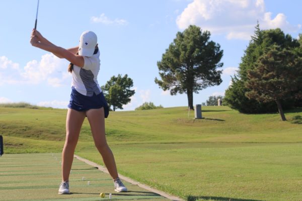 Junior Stalee Fields swings her club at the Coyote Ridge Golf Club on Sept. 19, 2022. Last season, Fields was the district champion.
