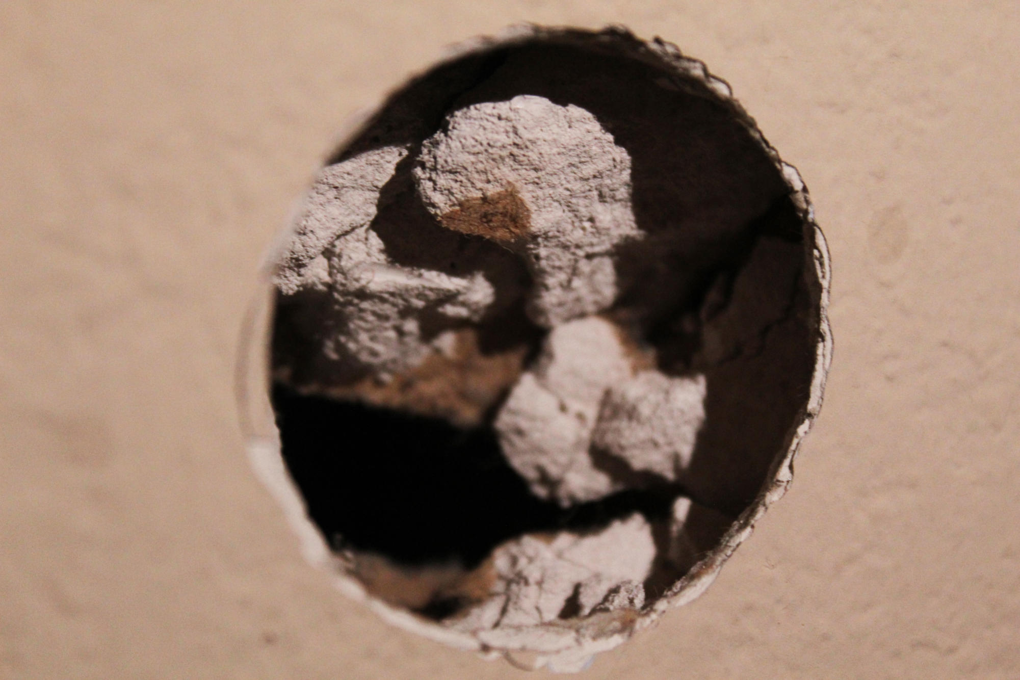 A hole in the wall of the master bedroom of the Fredericks’ house made during an argument between Izzy and her parents. The hole was made when Izzy slammed a door open after Minerva closed it.