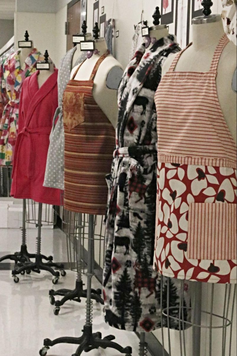 Fashion design classes unveil their aprons and robes at the gallery. They are all handmade and made with different materials.