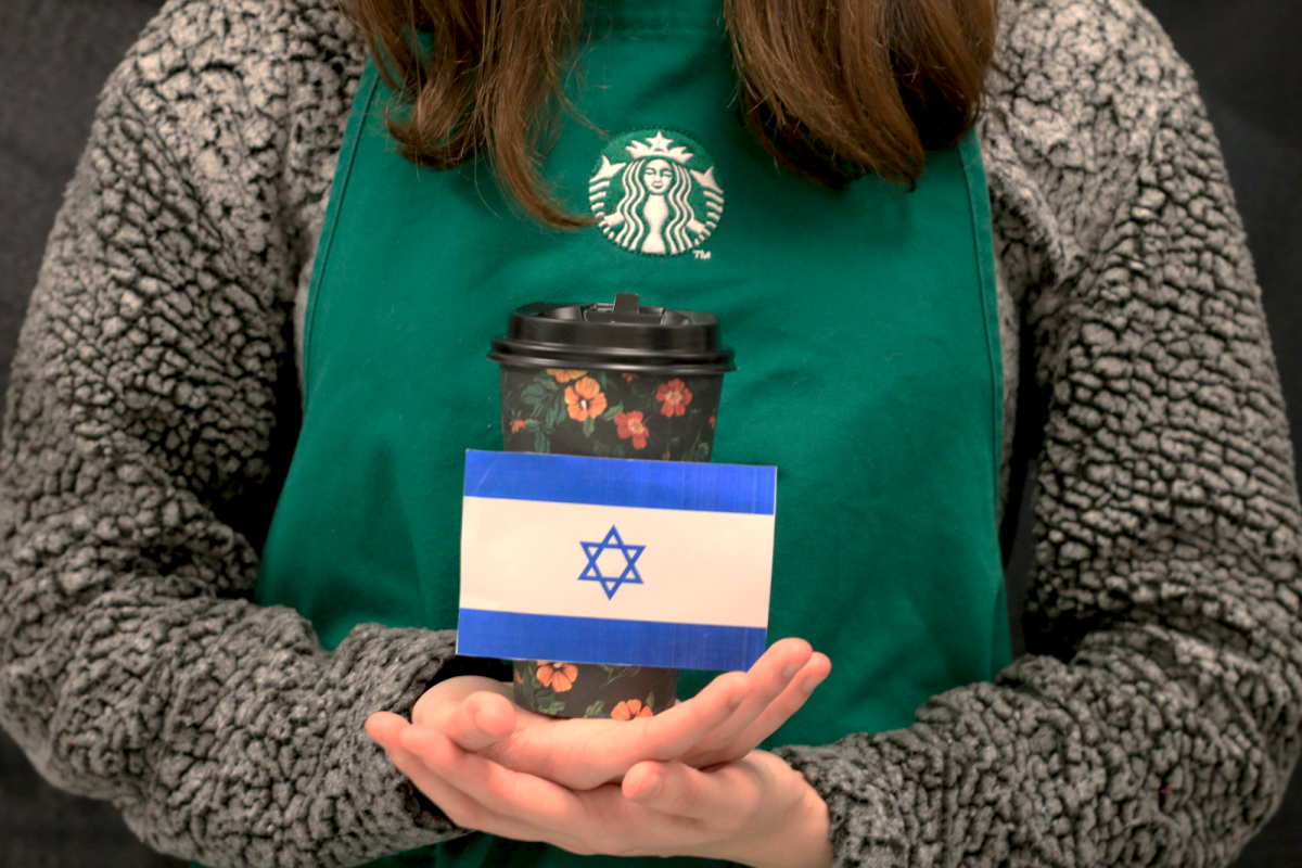 Due+to+the+recent+conflict+between+Israel+and+Palestine%2C+people+have+been+boycotting+companies+that+fund+Israel.+One+of+these+companies+is+Starbucks%2C+which+now+faces+both+boycotters+and+supporters.