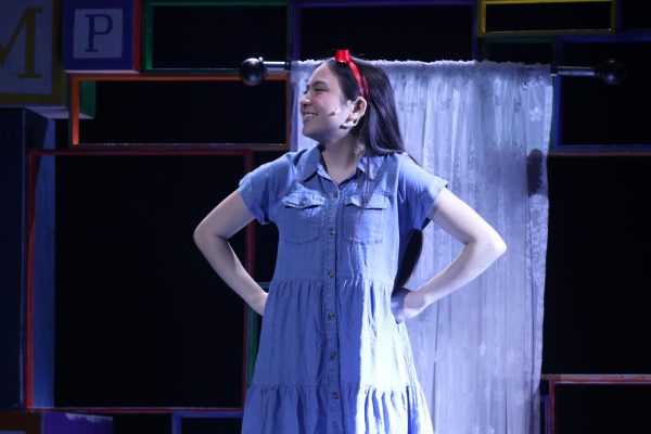 Junior Lucy Ward, who plays Matilda, stands at the end of her first solo song, “Naughty.” Ward joined Theatre 1 her freshman year, and this is her debut as a lead. “I love singing, dancing and acting,” Ward said. “I’m so passionate about it. I love being able to share these beautiful stories with the world.”