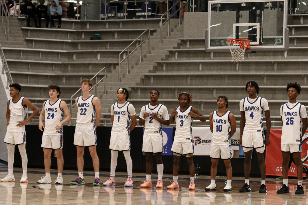 The boys basketball team gets ready to face Flower Mound on Jan. 9. The team won   the game 82-35. The Hawks are currently on a 14-game win streak, and are undefeated in the district season.