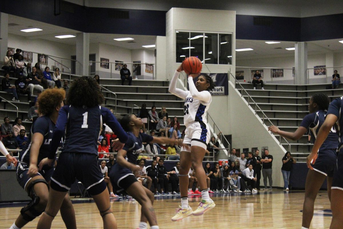 Guard Paris Bradley shoots a jump shot late in the first quarter against Little Elm on Feb. 20. The Lady Hawks beat Little Elm 53-47 in the regional quarterfinals.