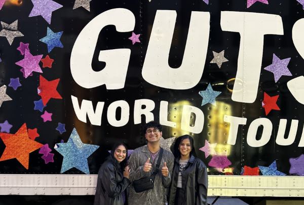 My friends (left and right) and I (middle) pose at the tour buses for the “GUTS World Tour” outside American Airlines Center on March 1. This was Rodrigo’s third show on the tour, following shows in Palm Springs, California and Phoenix, Arizona. 