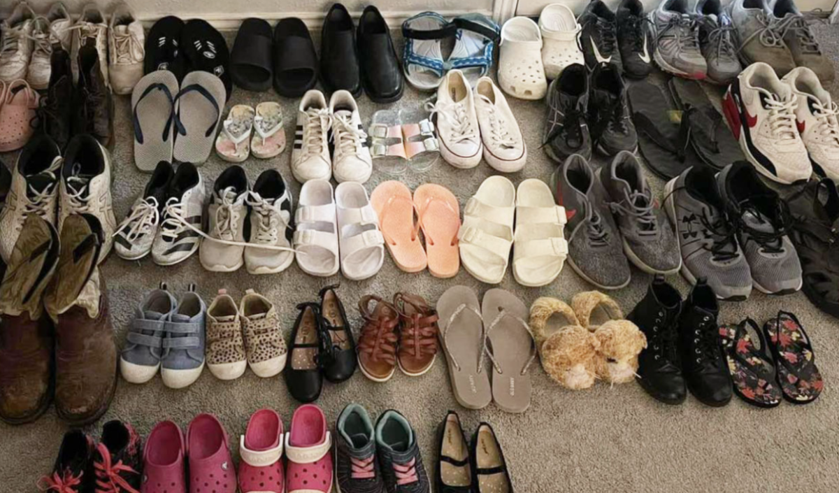 Several+donated+shoes+lay+across+the+floor%2C+ready+to+be+bundled+and+shipped+out+to+developing+countries.+The+Desperados+started+a+shoe+drive+to+collect+money+for+its+upcoming+baseball+tournament+in+South+Carolina+June+21-27.+