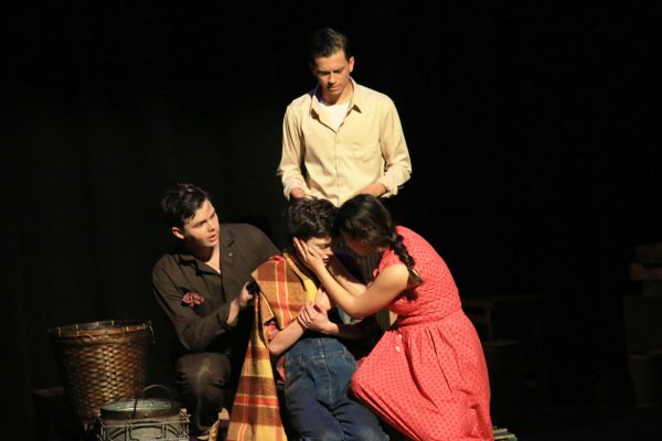(Left to right) Seniors Andrew Butts, Jimmy Sanchez, Valerie Rameriz and junior Grant Kochact during the finale of Act One. After a near-fatal experience with water when he was younger, Koch’s character — teenager Buddy Layman — cannot mentally mature past the age of 3 and has a fear of water. 