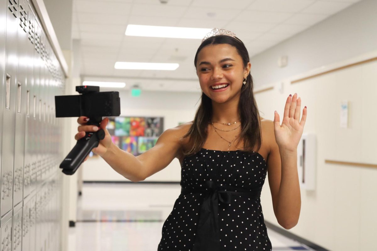 Sophomore Echo Browne records an intro for an upcoming school vlog Dec. 8. She uses the Sony ZV-1F vlog camera to make her videos.