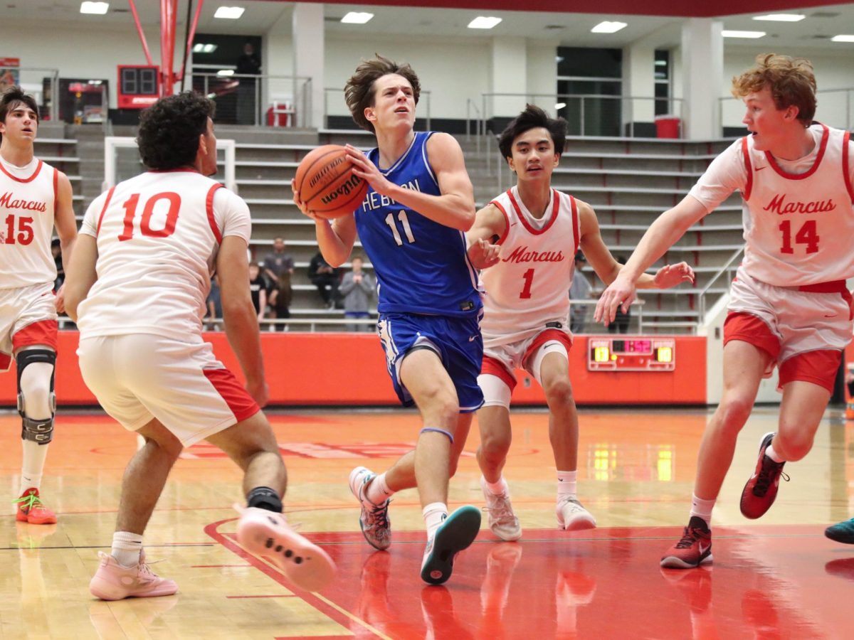 Photo Gallery: Boys basketball vs. Marcus 2/17
