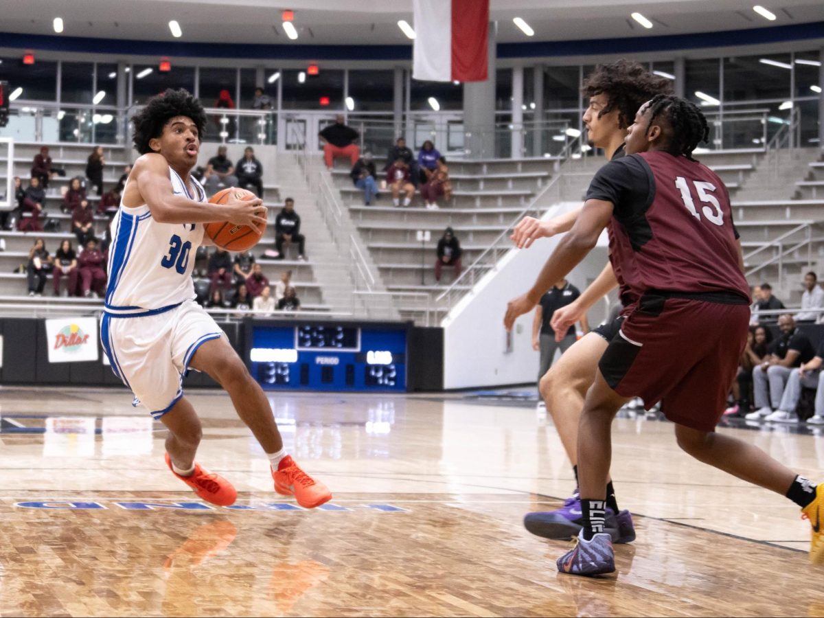 Guard Jevonaye Broussard drives into the paint Feb. 3, against Lewisville during the fourth quarter. The team lost the game 52-57.