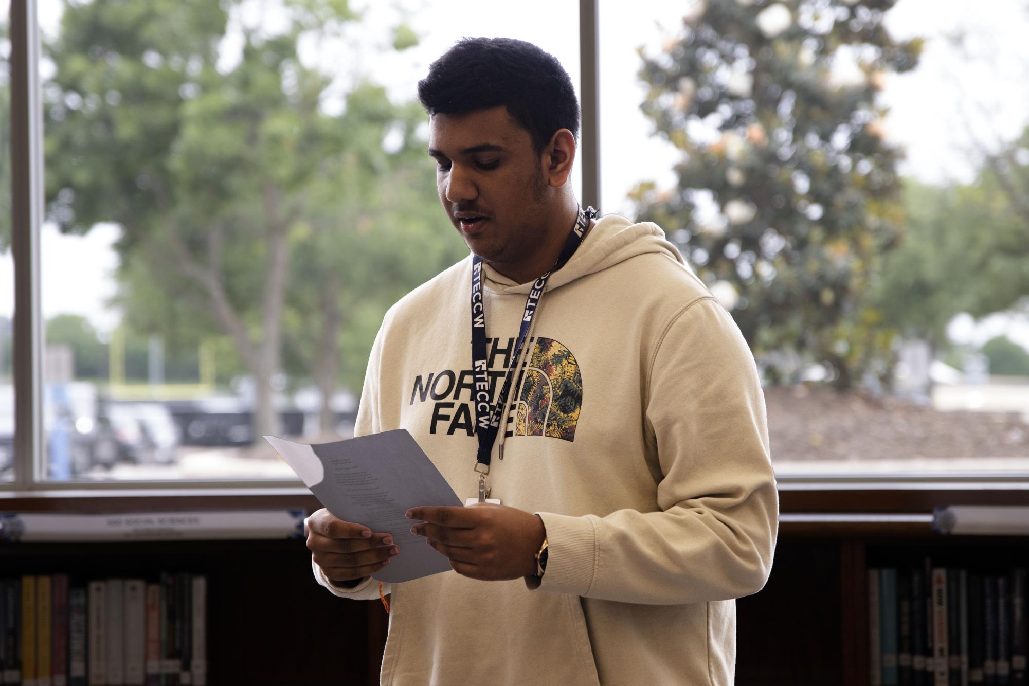 Junior Keshav Nair has been writing poetry since middle school, using it to navigate life and understand himself and others. He is the first winner of the National English Honors Societies’ spoken word poetry contest held in the library April 23.